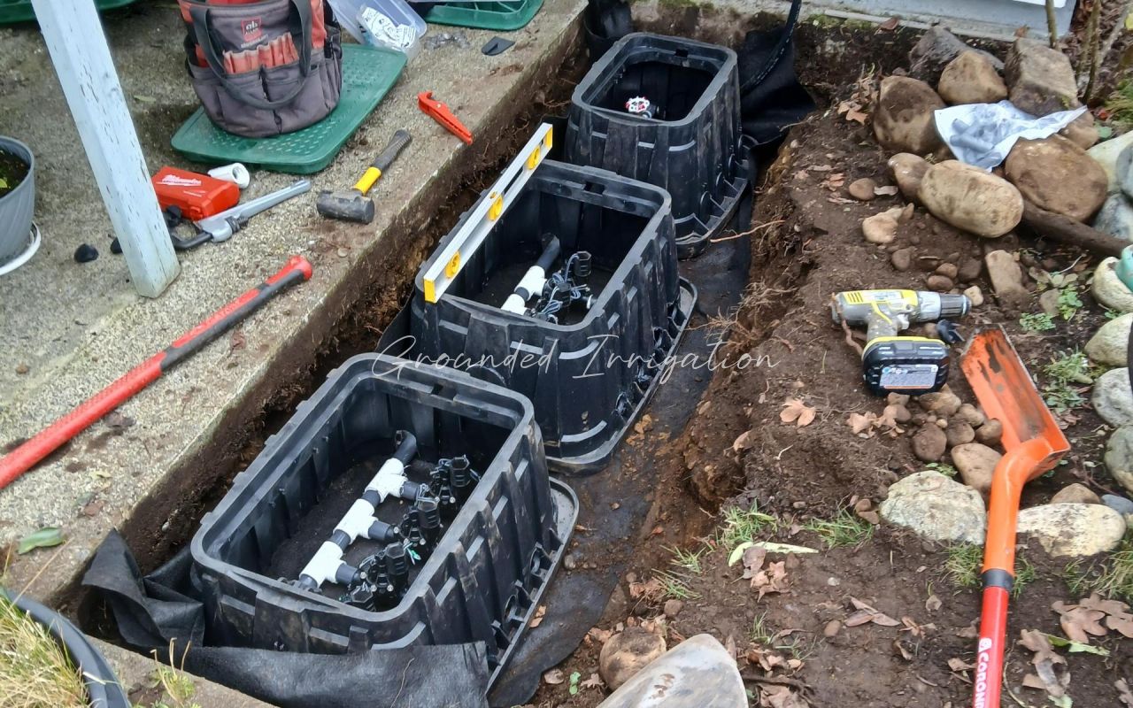 irrigation boxes leveled with fabric and valve bank